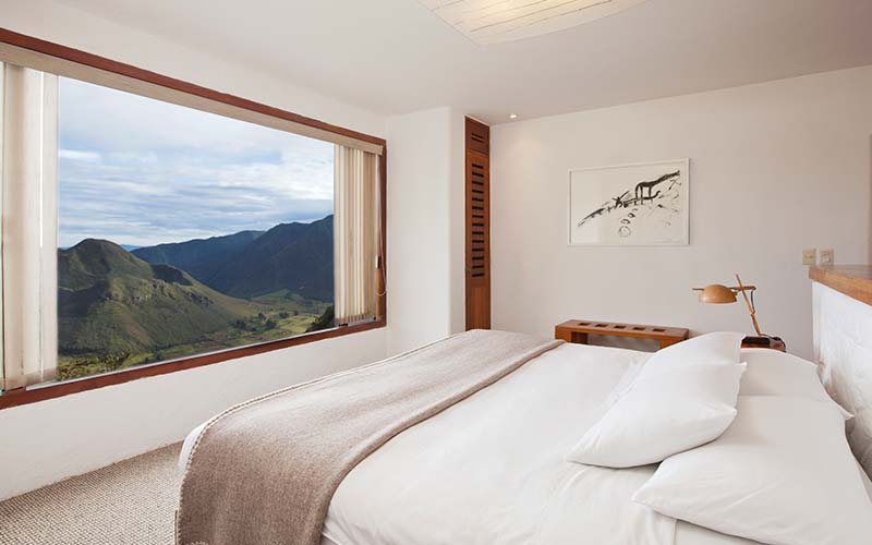 Het uitzicht vanuit de kamer in Landhuis-El-Crater in Ecuador