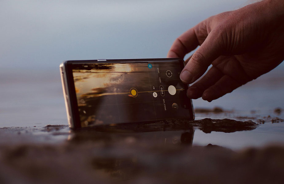 Een mooie strandfoto maken met je mobiele telefoon en per e sim versturen